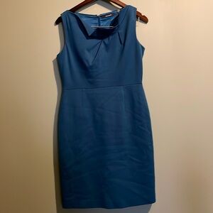 Tahari turquoise mid length sheath dress with asymmetrical neck line.